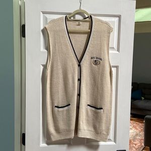 Never worn before BDG button up sweater vest. Perfect for layering.